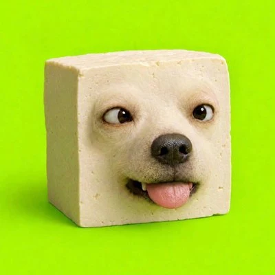 A cube of tofu with a dog's face on it